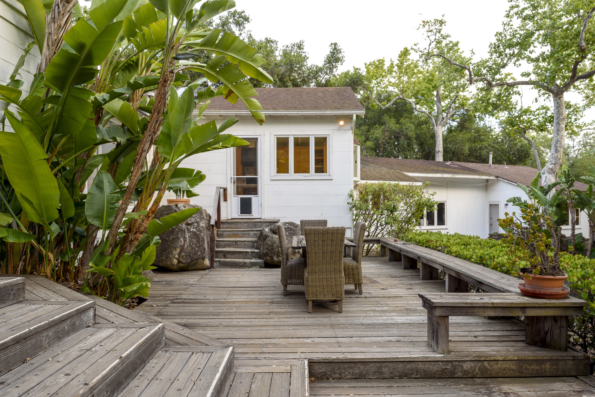 Built in patio deck with multiple sitting areas