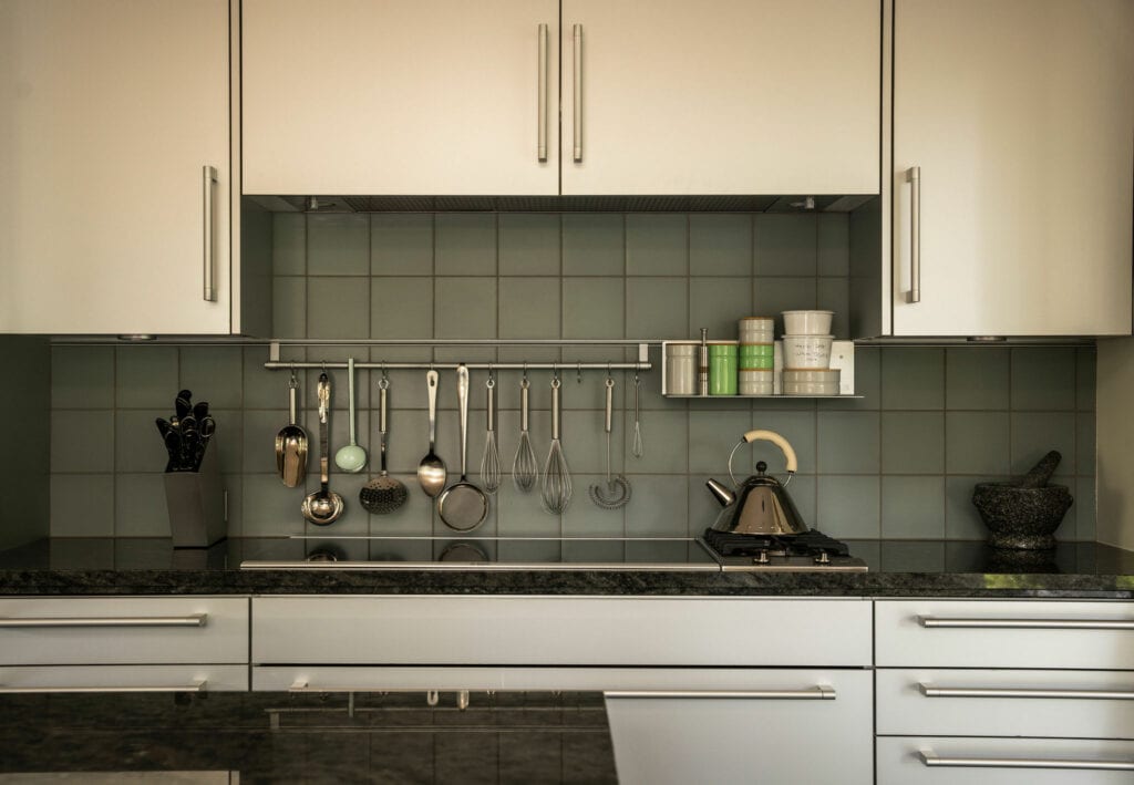 Custom Poggenpohl kitchen at The Erving House featuring European appliances and garden views
